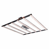 Spider Farmer G8600 full spectrum LED grow light with multiple illuminated bars and a visible control box.