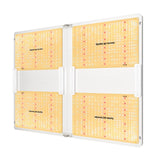 Spider Farmer SF7000 foldable full spectrum LED grow light with four panels of yellow and red diodes visible.