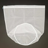 White translucent mesh drawstring bag with a blue cord lock, ideal for washing or filtering, on a dark background.