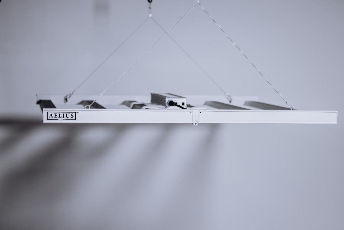Aelius LED grow light fixture with logo.