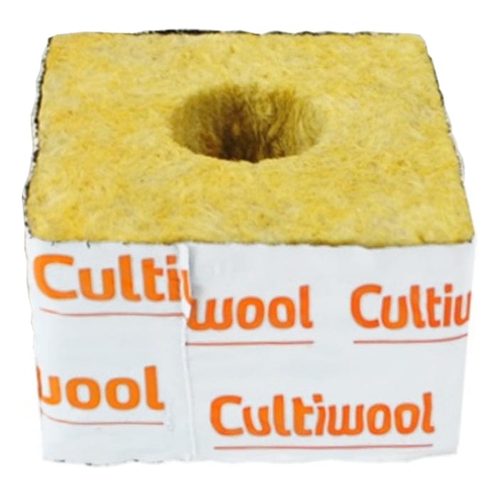 Yellow Cultiwool rock wool growing block for seed starting or hydroponics, with a central hole and Cultiwool branding.