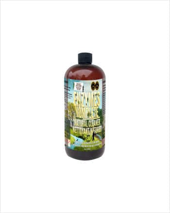 A brown bottle of "Enzymes Komplete" natural enzymatic cleaner with a black cap and a colorful label.