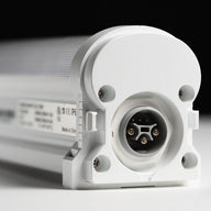 White under-canopy light with IP6 rating and multi-pin connector.