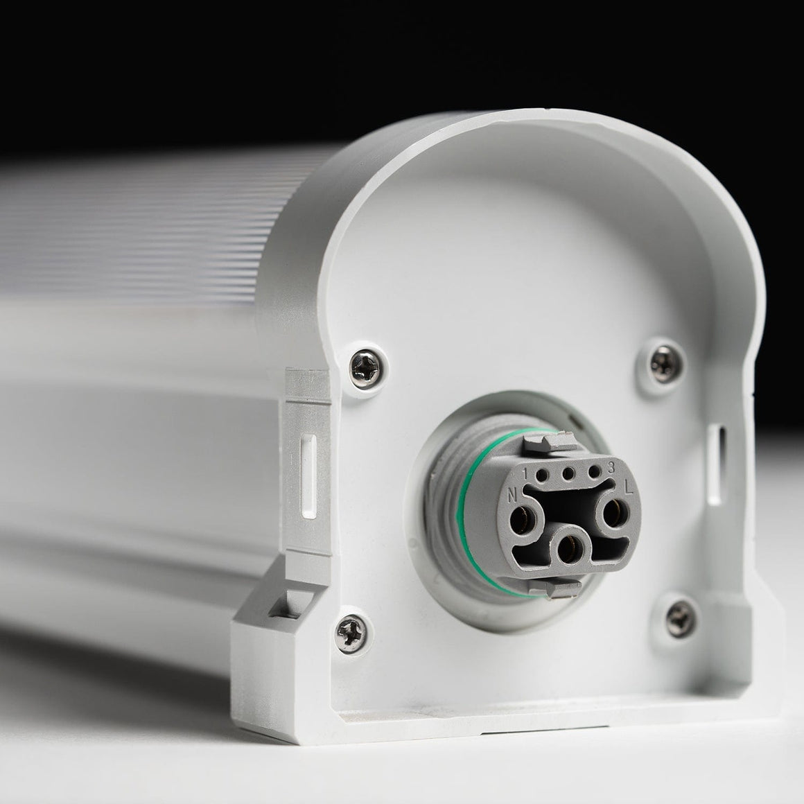 Close-up of a white LED light fixture's connector with "N," "1," "3," and "L" markings.