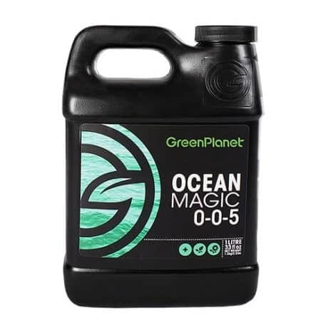 Green Planet Ocean Magic 0-0-5 kelp additive in a black jug.