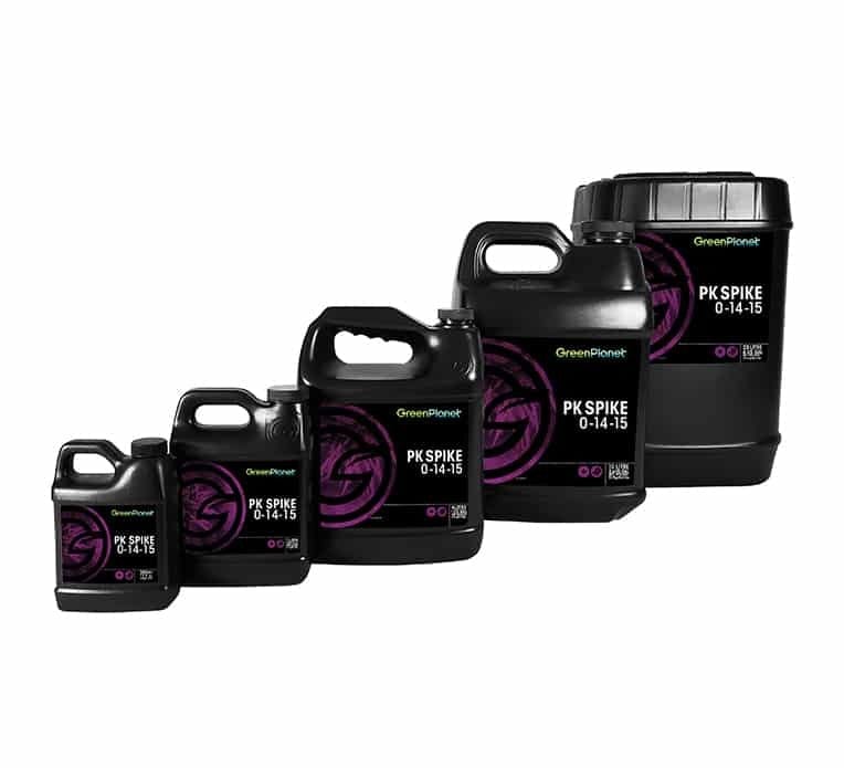 Five black bottles of Green Planet PK Spike 0-14-15 fertilizer in various sizes.