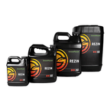 Green Planet Rezin terpene enhancer bottles in various sizes with black labels and orange-yellow circular graphics.