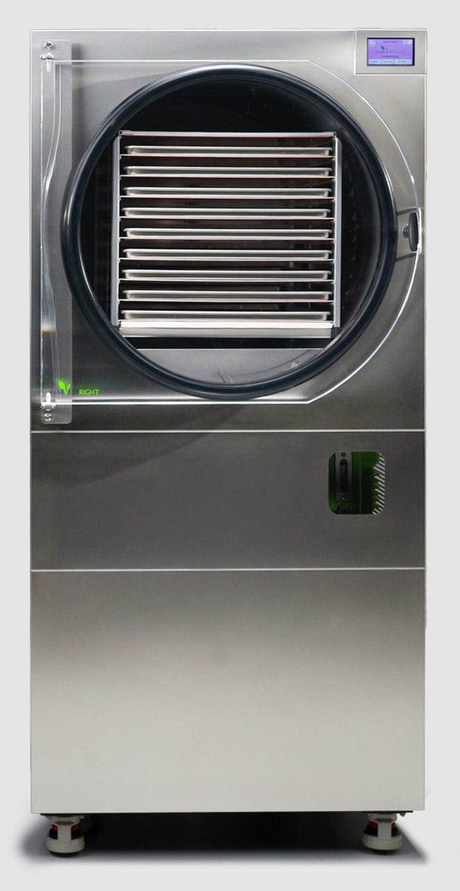 Commercial freeze dryer with digital display and multiple shelves inside.