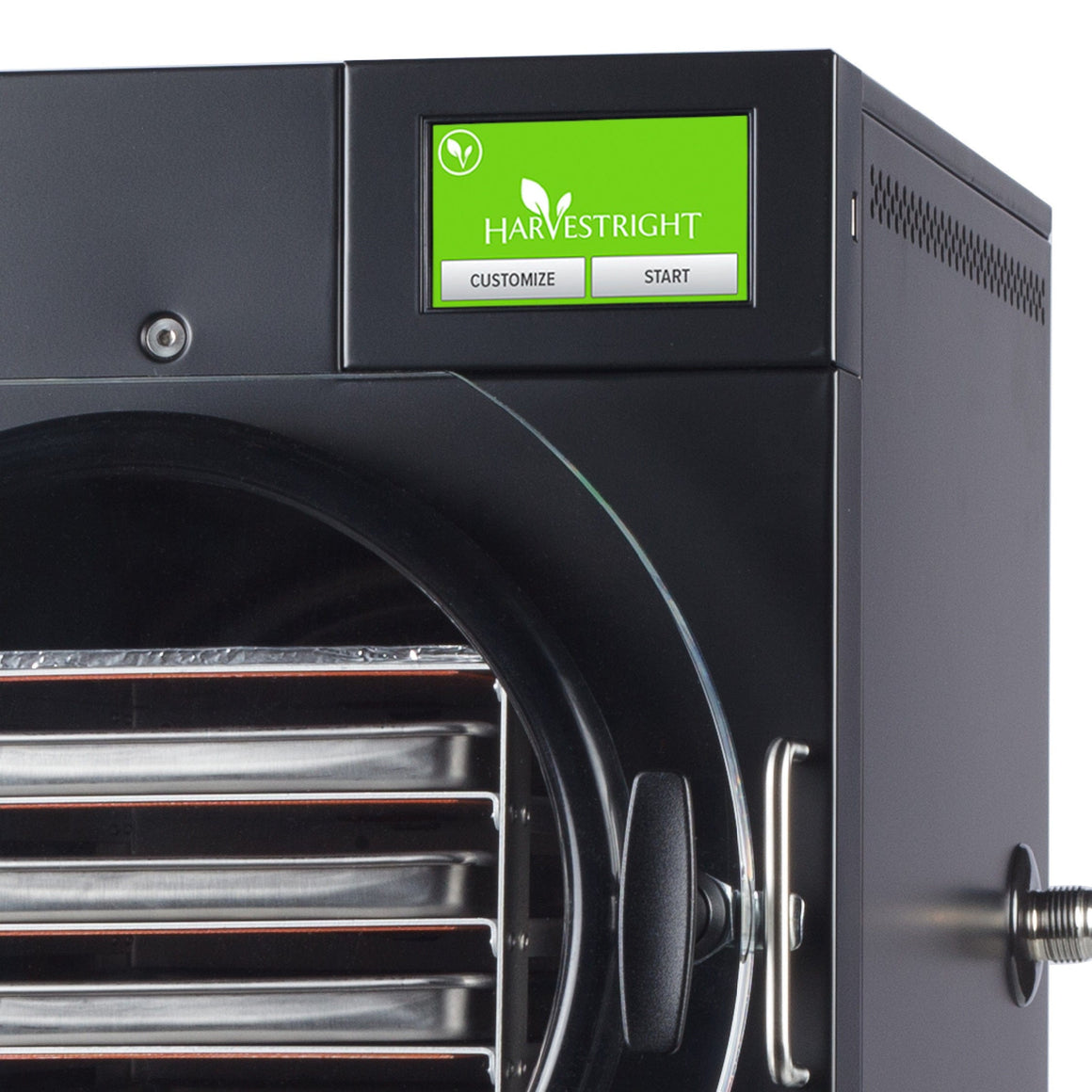 Black powder-coated small HarvestRight home freeze dryer with a green touchscreen display and multiple trays inside.