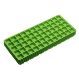 Stack of 5 green Harvest Right silicone food molds with square cavities, ideal for making treats or ice.