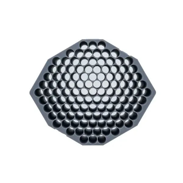 Octagonal grey tray with many circular compartments, on white background.