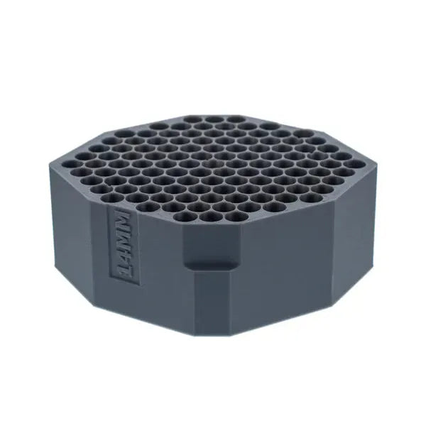 Dark gray hexagonal tray with 100 individual circular slots for 14mm items.