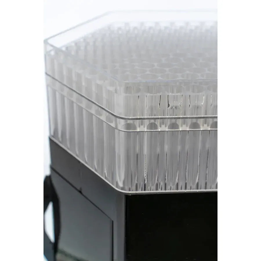 Hexagonal pre-roll cone filling machine with transparent tubes and black base.