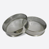 Two quick-sift commercial industrial stainless steel sieves with fine mesh screens.