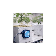 Blue substrate sensor attached to a plant pot in a hydroponic grow tent.