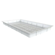 White flood tray with grid pattern inside, used for growing plants hydroponically.