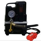 Black 10,000 PSI mini electric hydraulic pump with a pressure gauge, coiled hose, and red remote control.