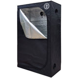 Black grow tent, partially unzipped, revealing reflective silver interior for indoor plant cultivation, with logo and vents.