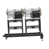 Two Twister T4 variable-speed tandem bud trimmers and leaf collectors, silver and black, on a sturdy stand.